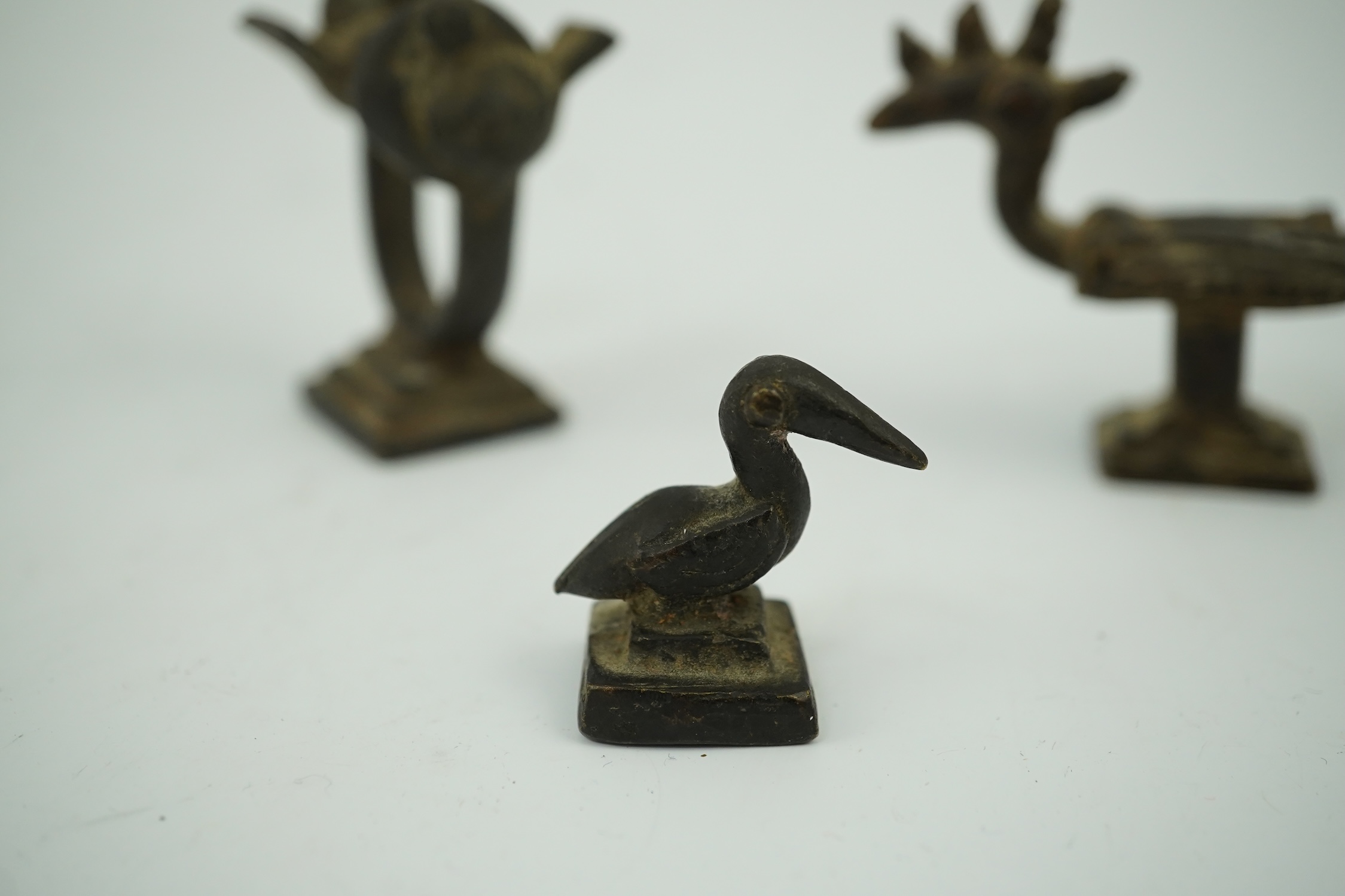 Three African bronze ‘bird’ gold weights, largest 6cm wide. Condition - good